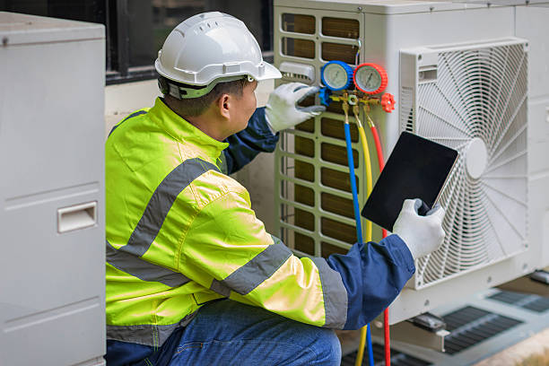 Professional Heat Pump Repair technician working in Vincent, AL